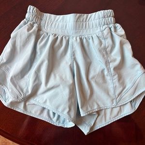 Lululemon shorts in light blue w/ side zip pocket.